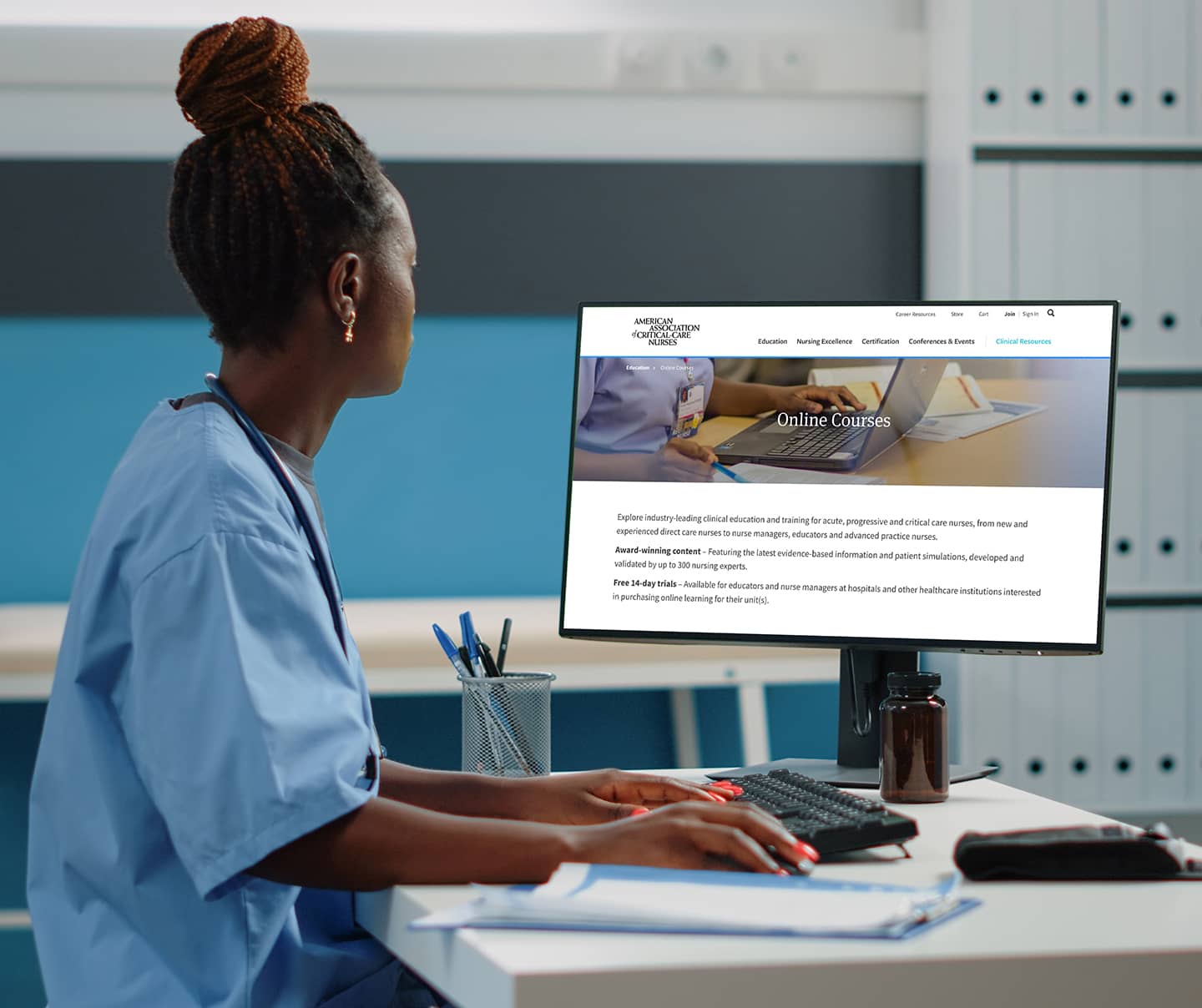 Nurse looking at AACN's website