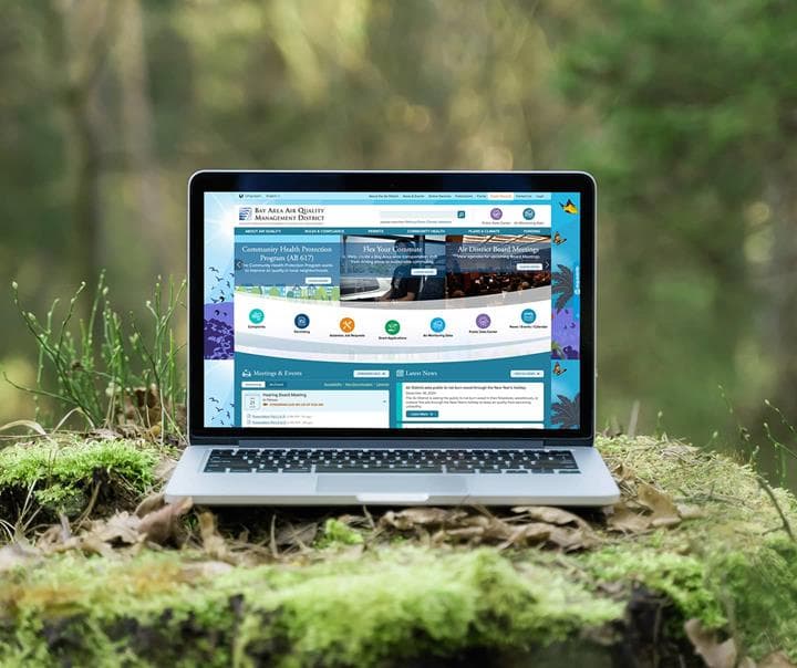 Laptop screen with BA AQMD Home page