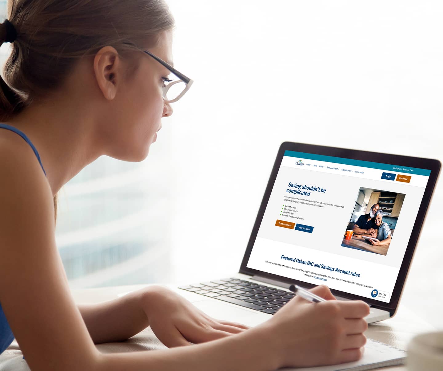 Woman looking at Oaken's website