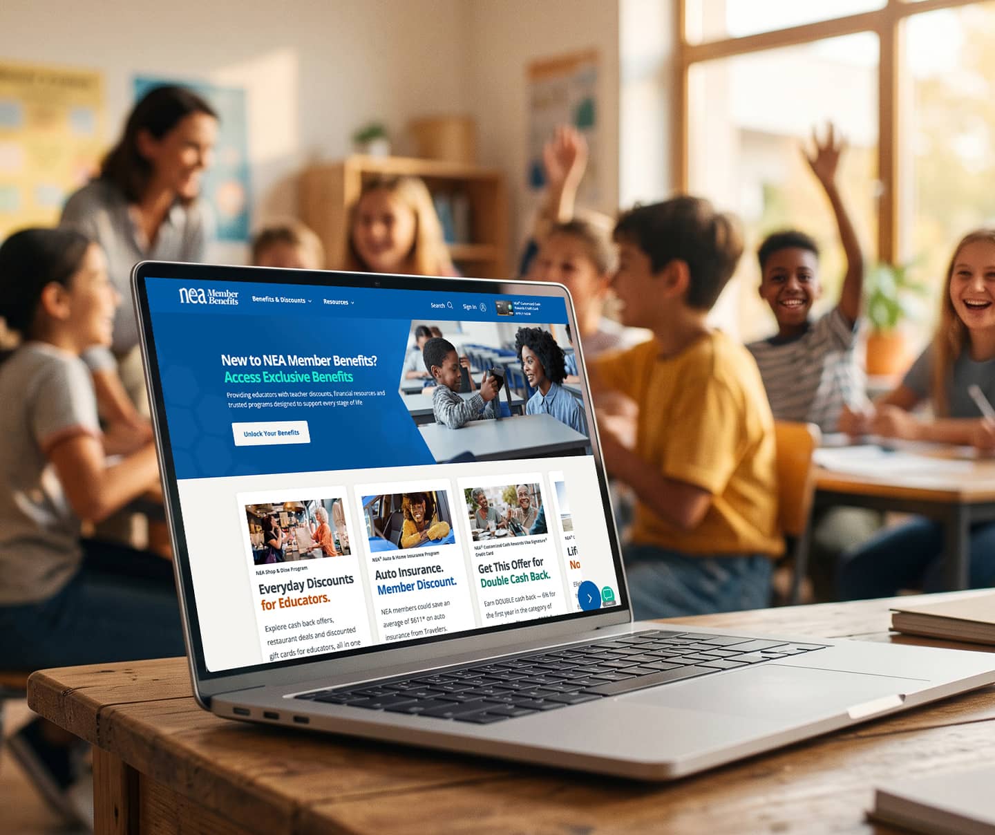 Teacher's computer in a classroom displaying NEAMB's homepage