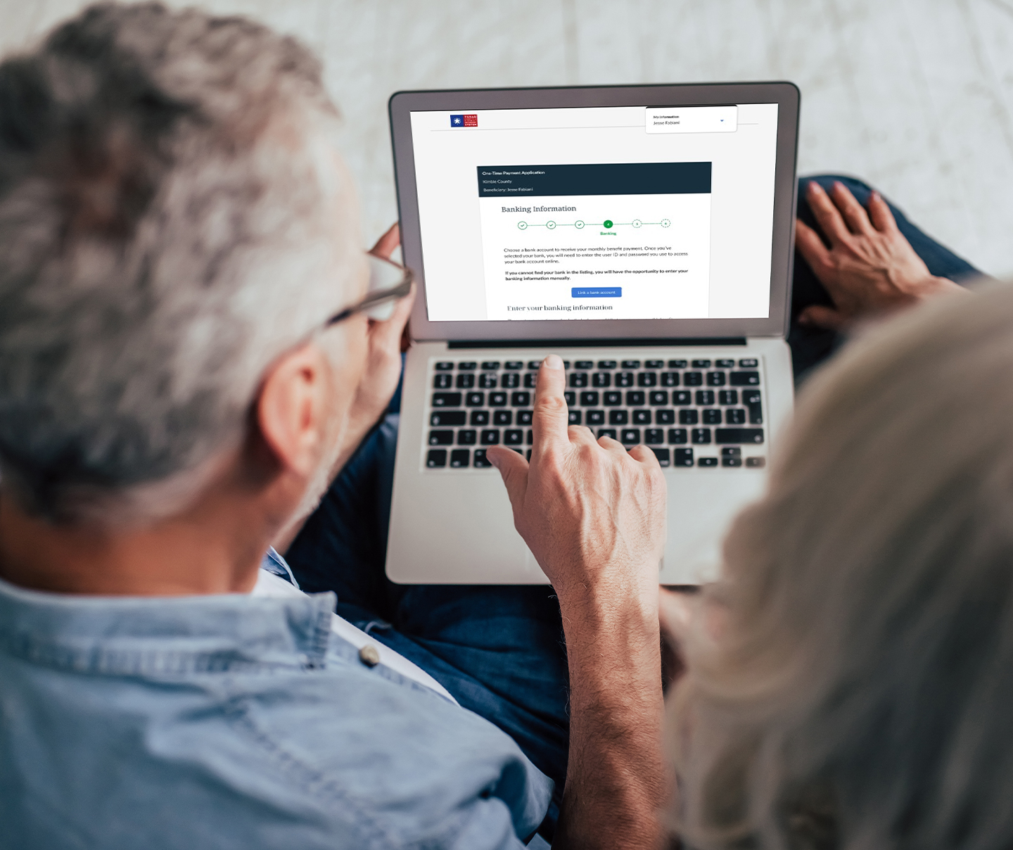 Senior couple looking at TCDRS Retiree Death portal