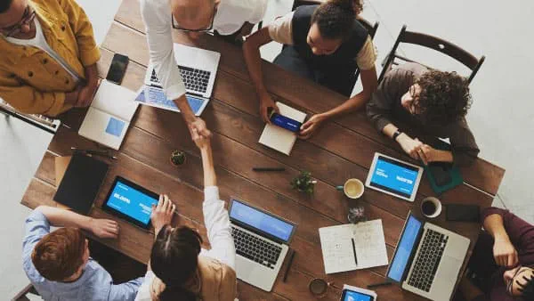 Working together around table