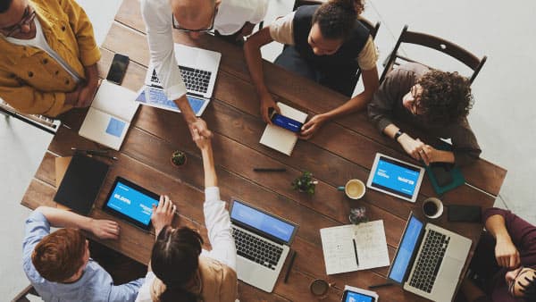 Working together around table