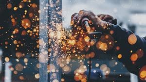 machine worker using heavy tools