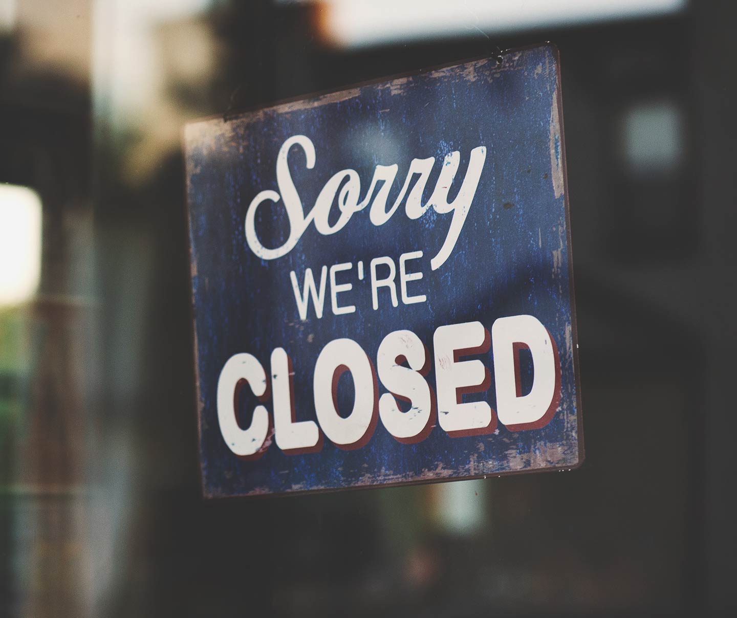 Sorry We're Closed sign representing downtime