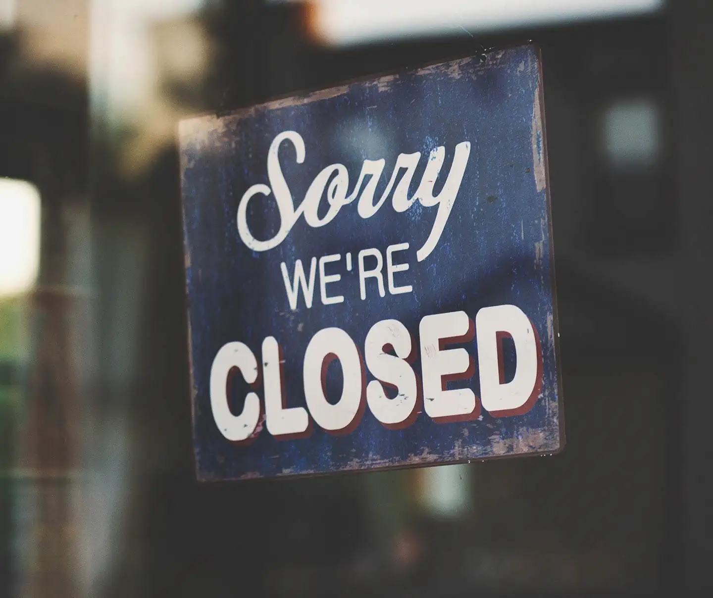 Sorry We're Closed sign representing downtime