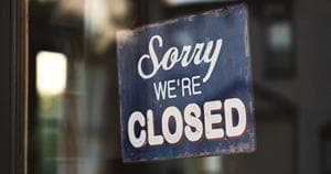 Sorry We're Closed sign representing downtime