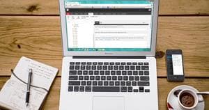 Laptop with Sitecore XM on screen