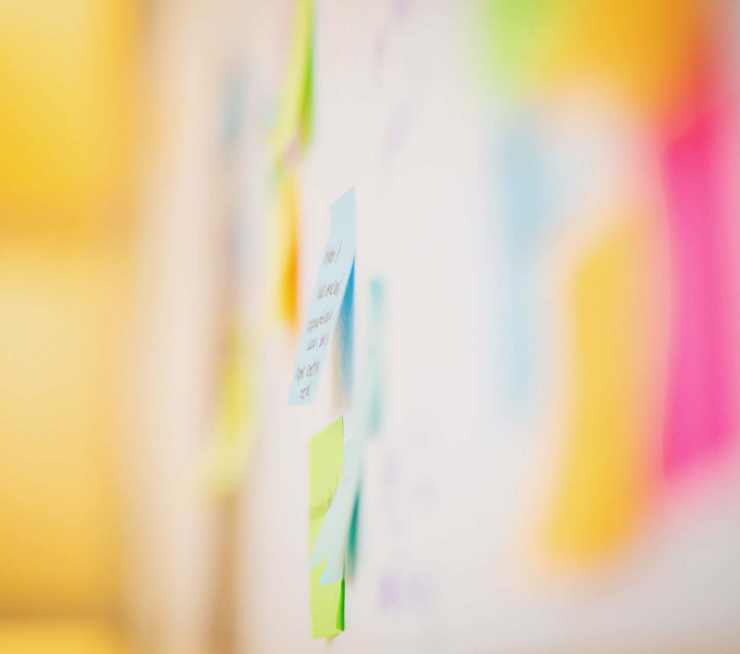 Post-it notes on board for planning a workflow