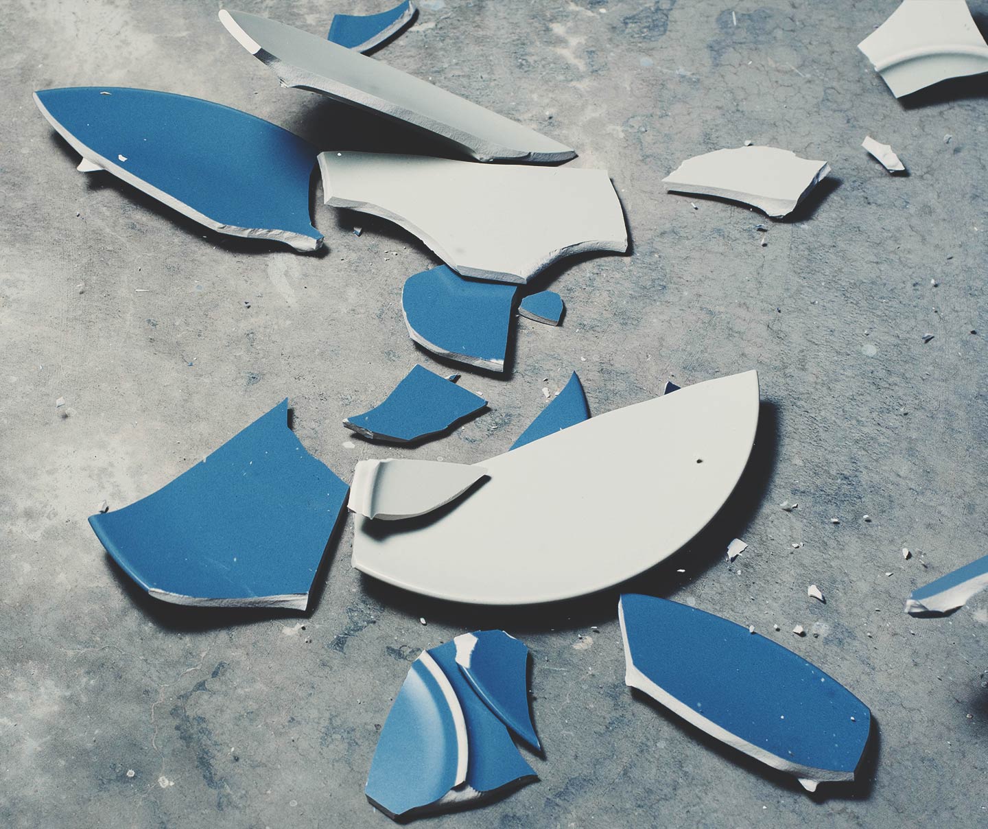 Broken plates representing mistakes