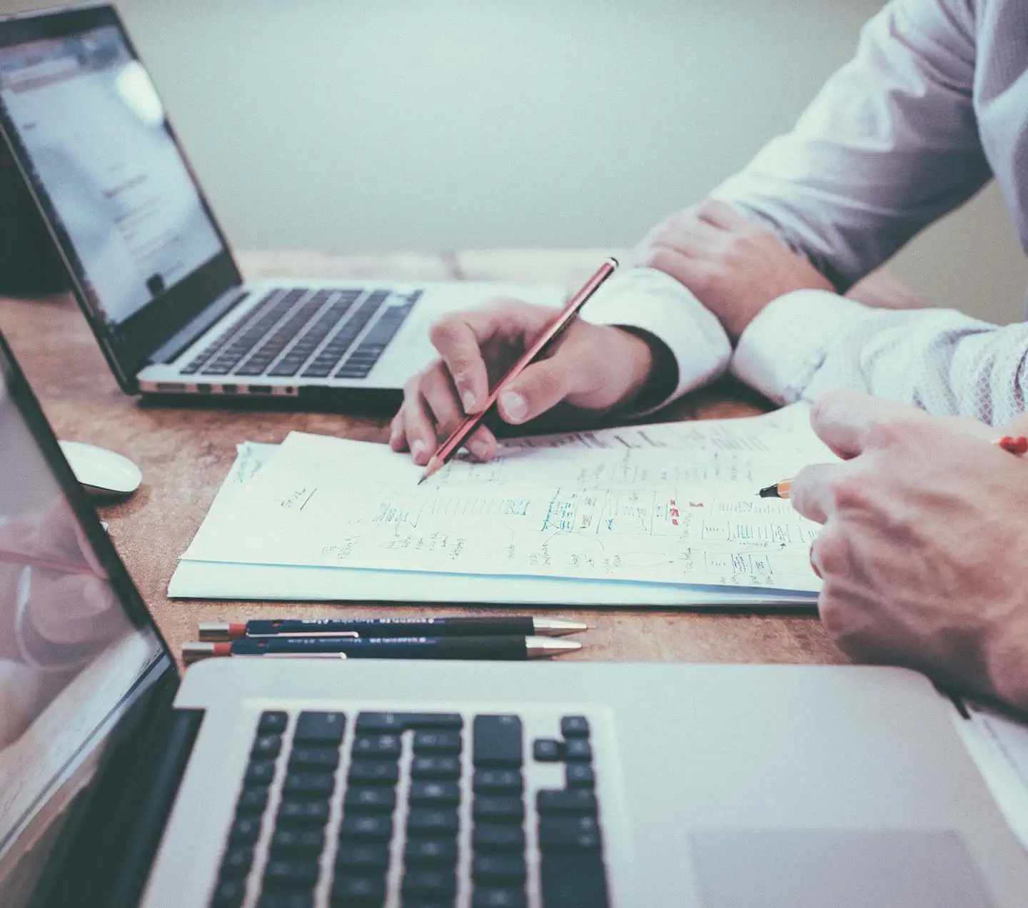 Two men auditing a website