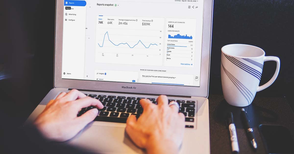 Person using Google Analytics on a laptop