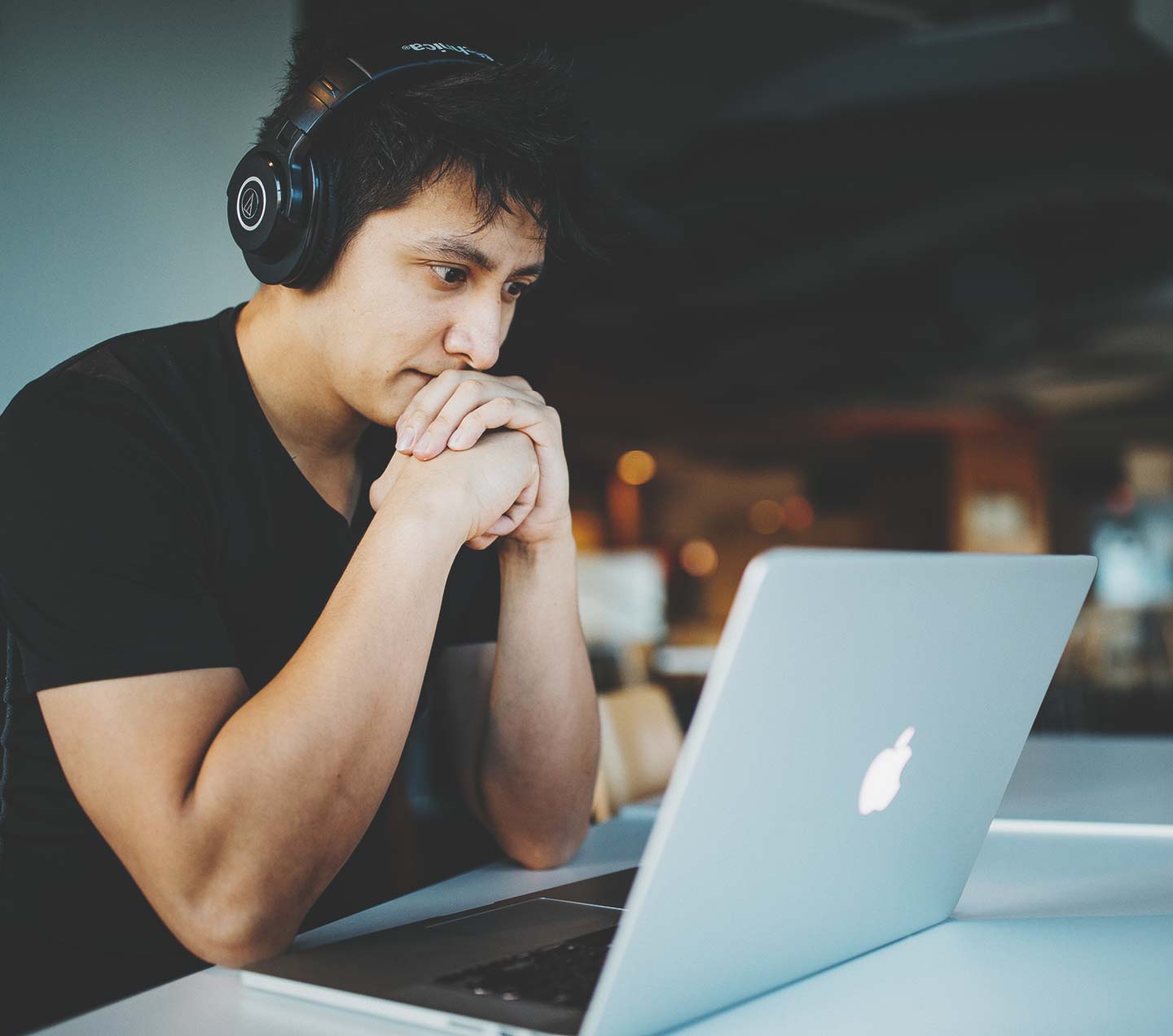 AEM developer working on a laptop