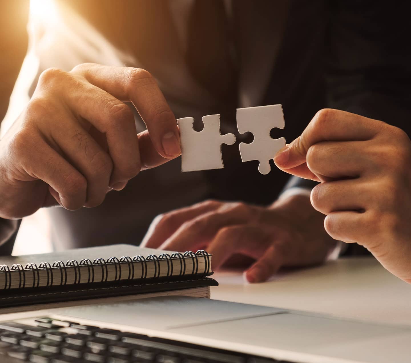  Business people hands connecting jigsaw puzzle representing success