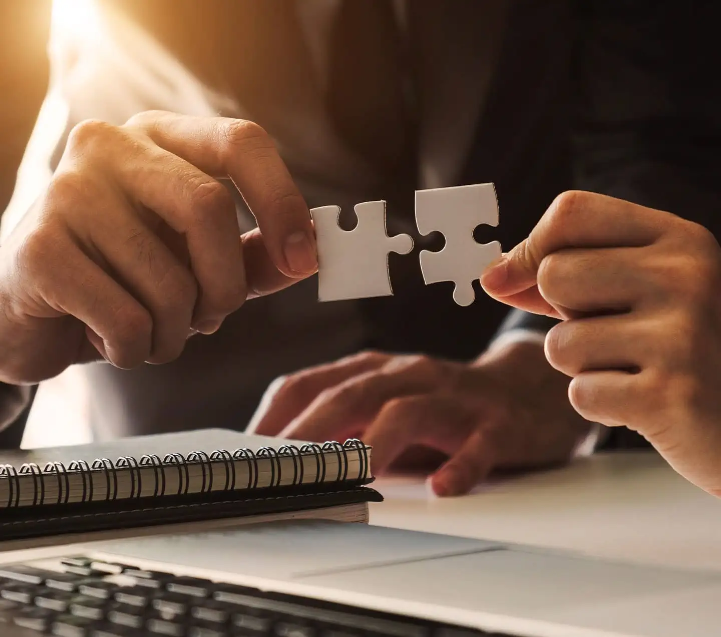  Business people hands connecting jigsaw puzzle representing success