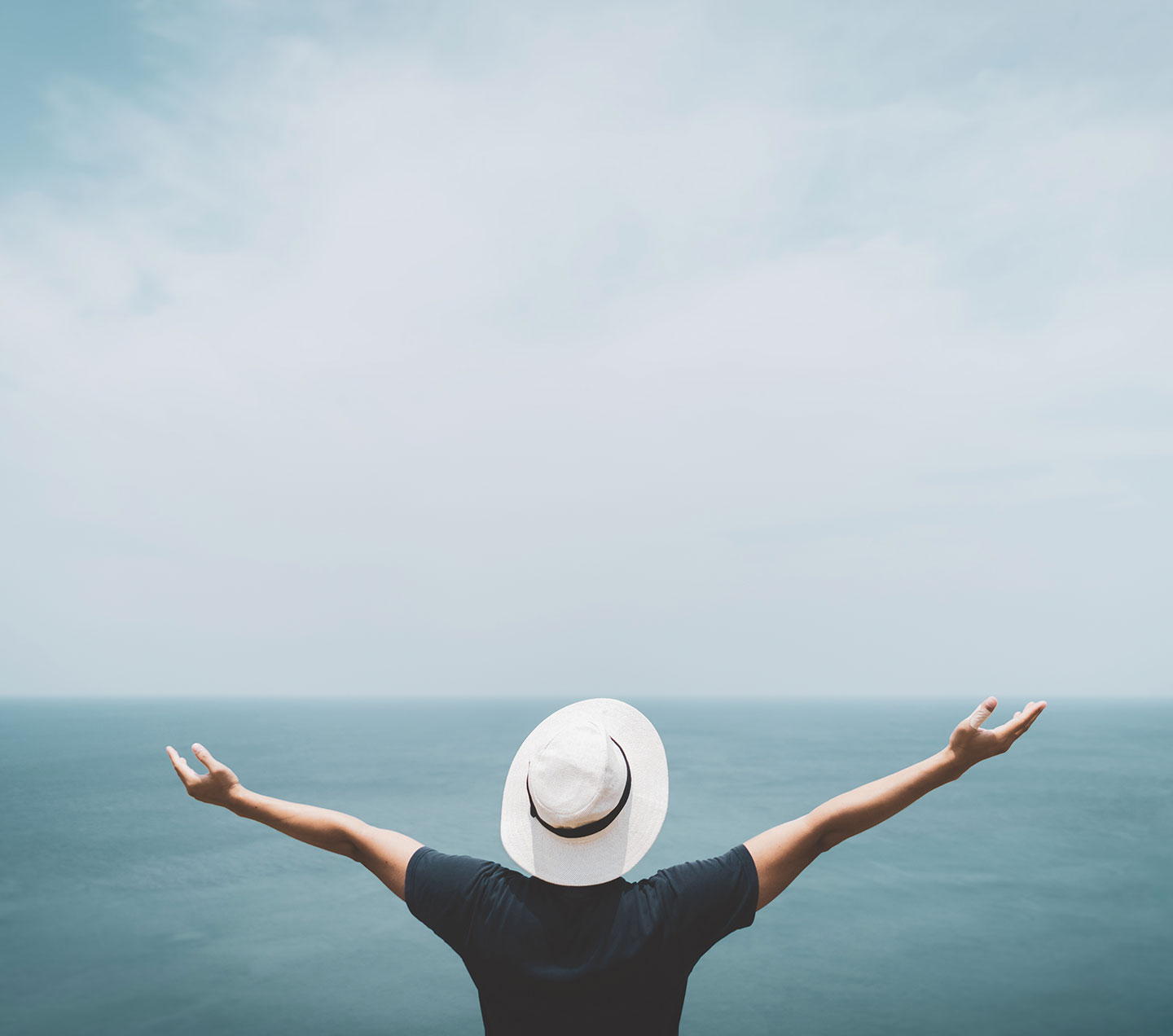 Man with outstretched arms welcoming the latest Sitecore XP release