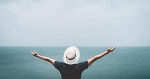 Man with outstretched arms welcoming the latest Sitecore XP release