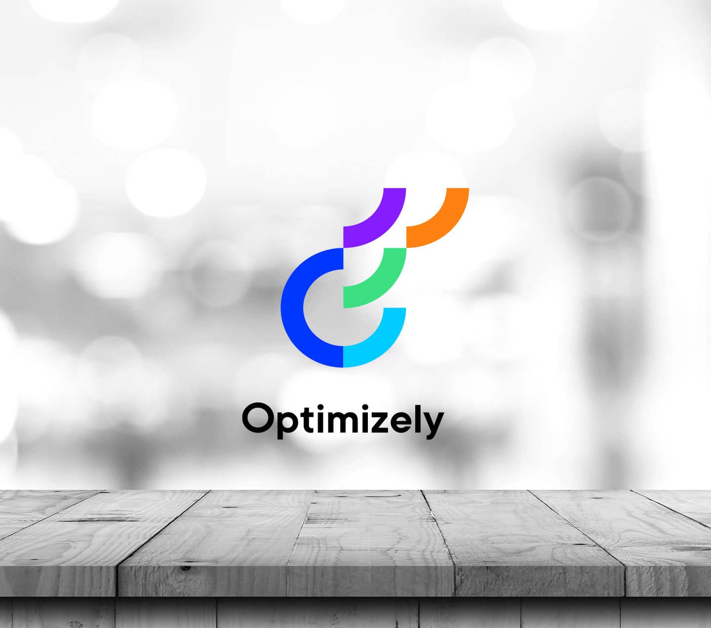 Table and blurred background with Optimizely logo