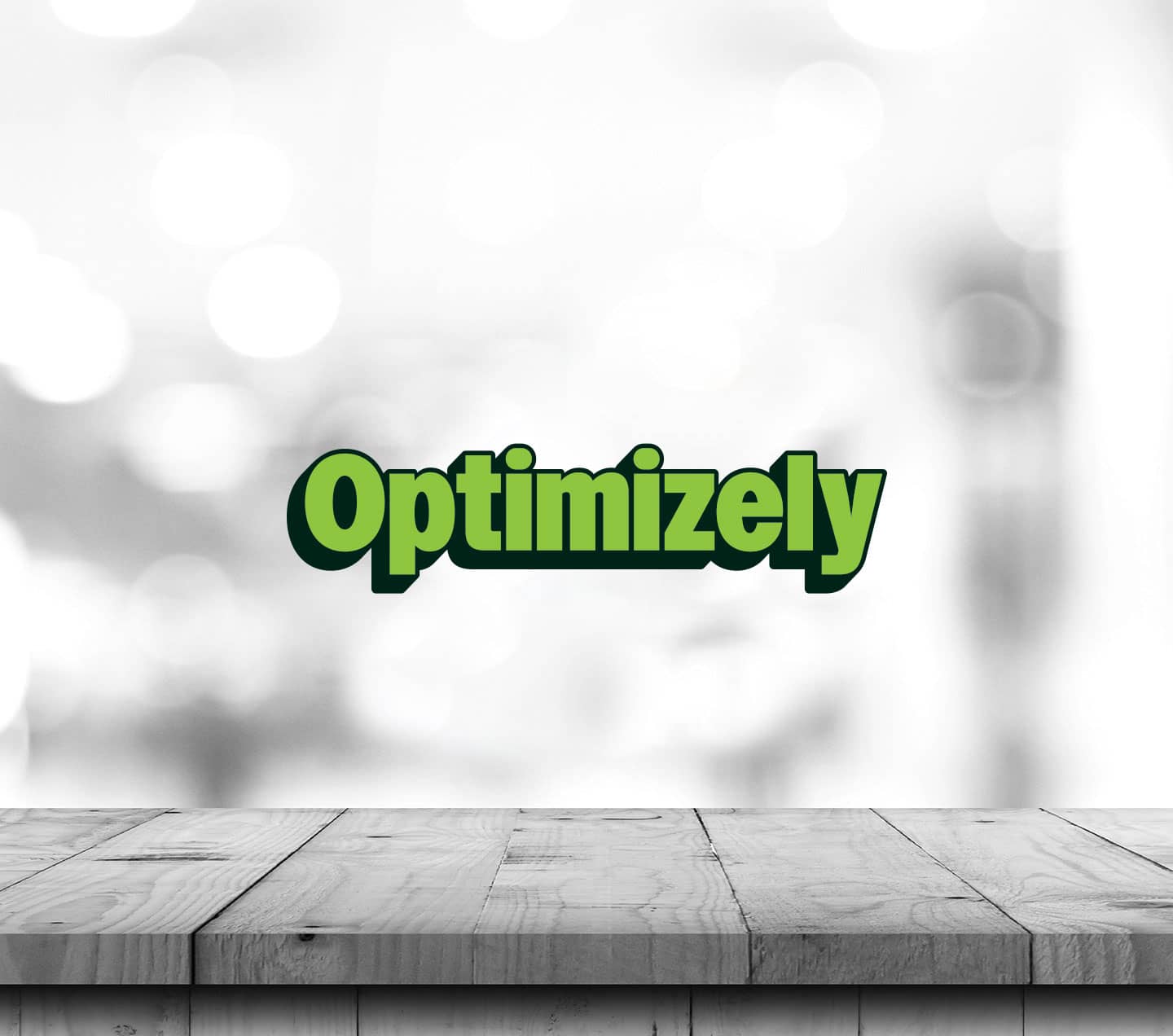 Table and blurred background with Optimizely logo