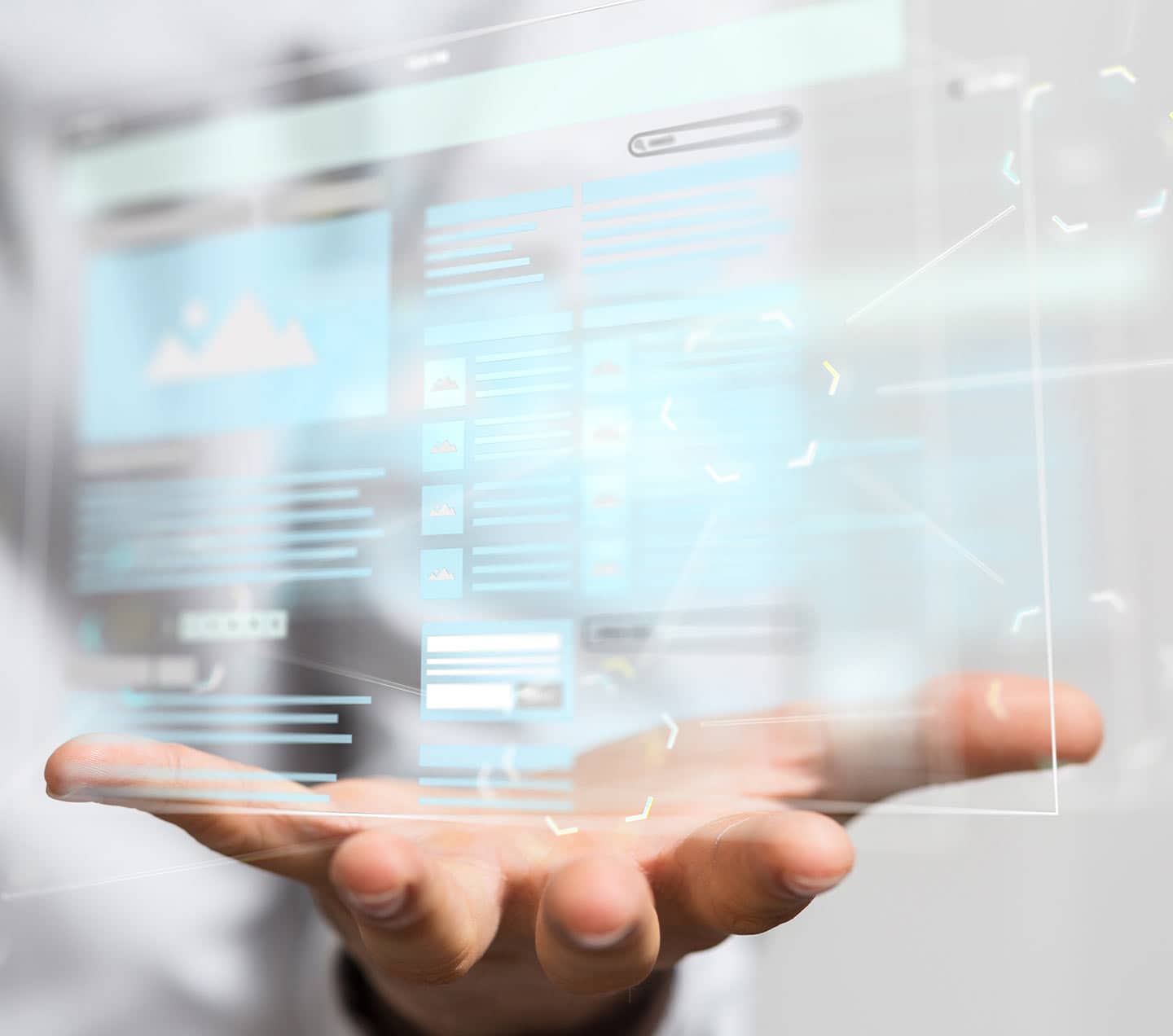 Hand holding a website hologram