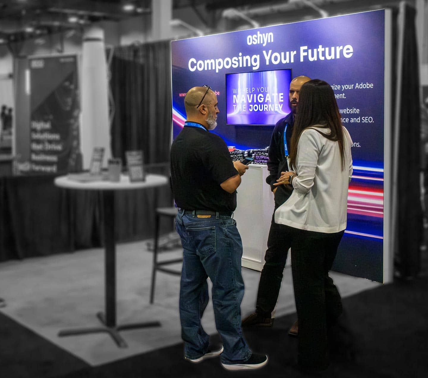Oshyn booth at Adobe Summit 2025