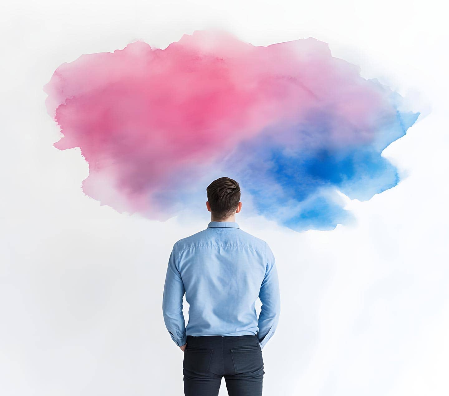 Man in front of a wall looking at a pink/blue painted cloud
