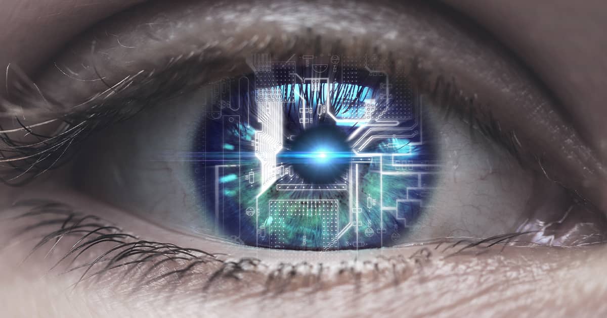 Female eye with overlay of printed circuit board.