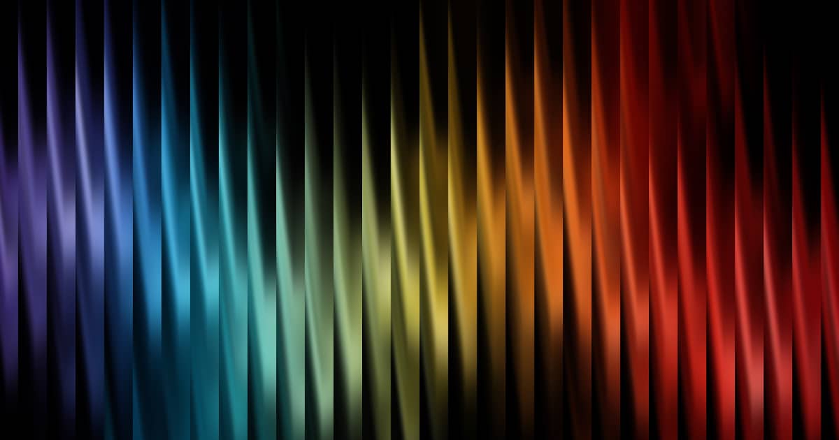 Vibrant striped pattern composed of vertical lines with a spectrum of colors