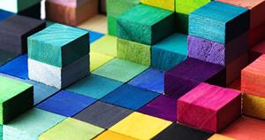 Spectrum of stacked multi-colored wooden blocks