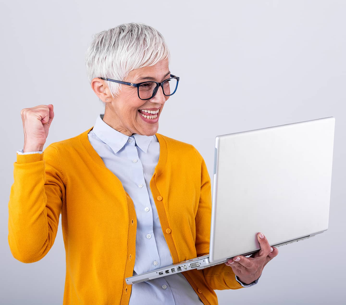 Happy older woman looking at a perfectly accessible website