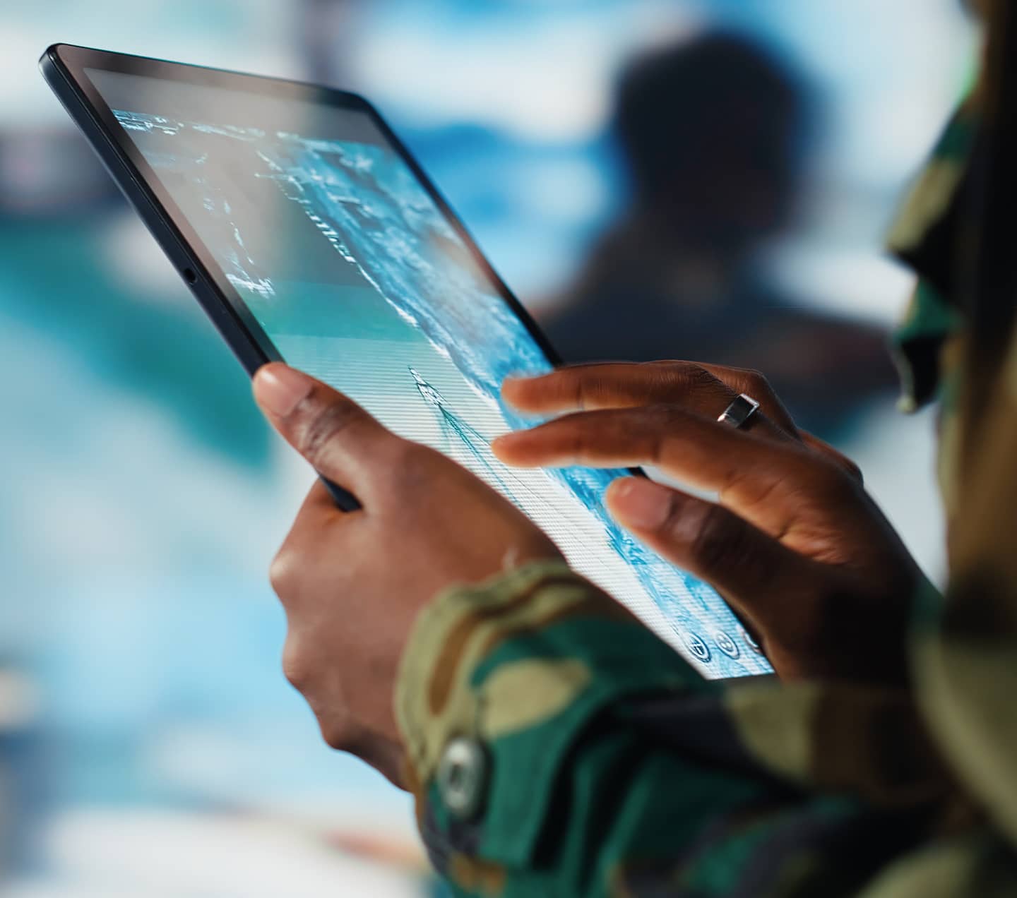 Woman's hands working on a tablet