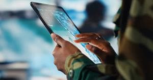 Woman's hands working on a tablet
