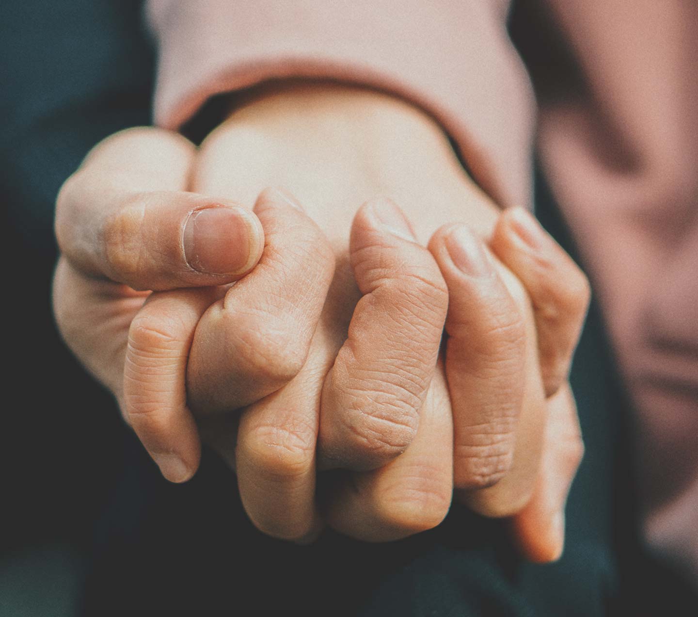 Hands holding