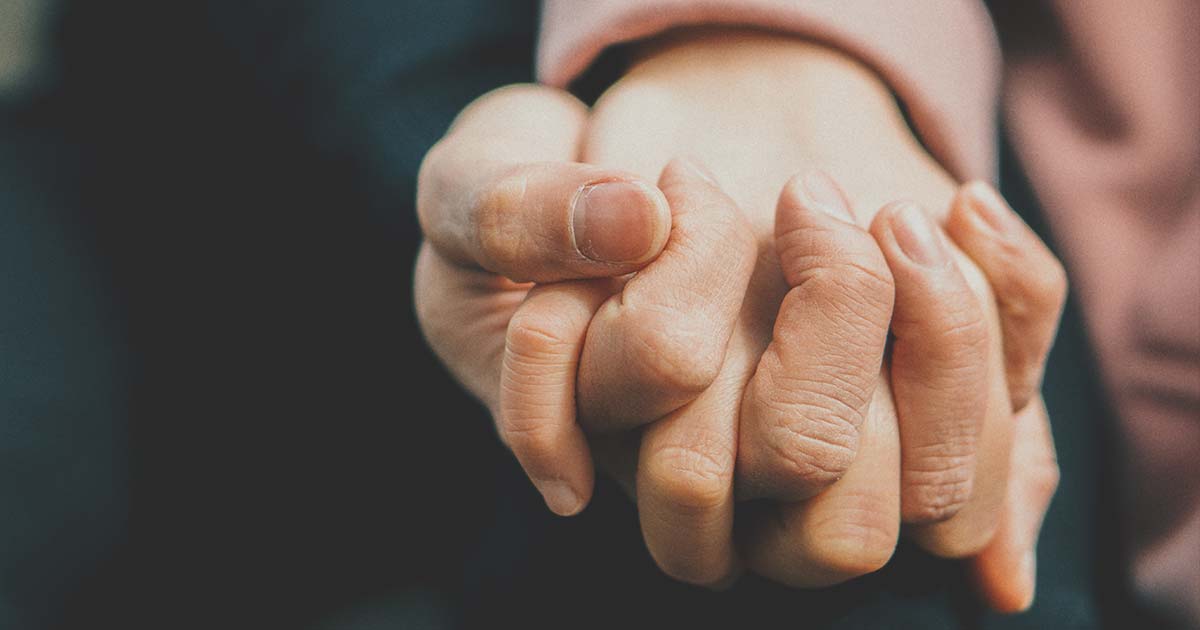 Hands holding