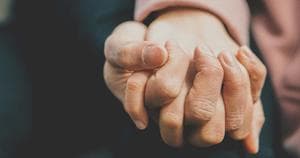 Hands holding
