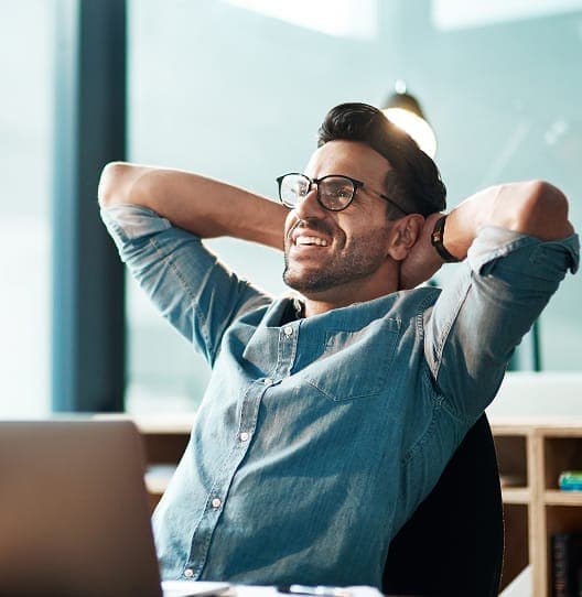 Man relaxing after hiring Oshyn